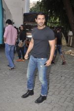 John abraham lifts a bike at Force Promotions in Mehboob, Mumbai on 27th Sep 2011 (5).JPG