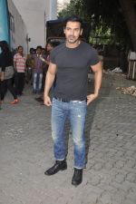 John abraham lifts a bike at Force Promotions in Mehboob, Mumbai on 27th Sep 2011 (6).JPG