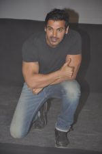 John abraham lifts a bike at Force Promotions in Mehboob, Mumbai on 27th Sep 2011 (45).JPG