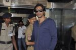 Arjun Rampal leave for Ra.One Premiere tour in Airport, Mumbai on 23rd Oct 2011 (26).JPG