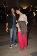 Imtiaz Ali, Nargis Fakhri snapped at the airport in Mumbai on 9th Nov 2011 (21).JPG