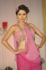 Model walk the ramp for Kimaya fashion show at Trrain Retail Awards in Taj Land_s End on 12th Dec 2011 (33).JPG