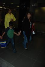 Madhuri Dixit snapped with kids and husband at the airport in Mumbai on 1st Jan 2012 (15).JPG