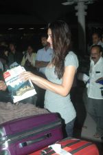 Nargis Fakri snapped at international airport on 1st Feb 2012 (66).JPG