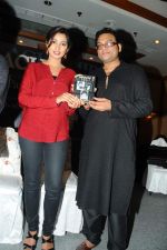 Shreya Ghoshal with Deepak Pandit at the launch of Deepak Pandit_s Album Miracle in at Orchid Hotel, Vile Parle on 8th Feb 2012.JPG