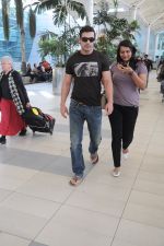John Abraham return from Varun Dhawan_s Wedding in Goa at Domestic Airport, Mumbai on 12th Feb 2012 (9).JPG