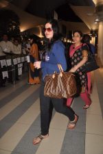 Zarine Khan with Housefull 2 Stars snapped at Airport in Mumbai on 4th April 2012 (37).JPG