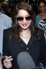 Madhuri dixit snapped with husband in Mumbai Airport on 6th April 2012 (12).jpg