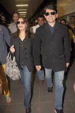 Madhuri dixit snapped with husband in Mumbai Airport on 6th April 2012 (19).jpg