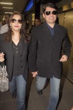Madhuri dixit snapped with husband in Mumbai Airport on 6th April 2012 (25).jpg