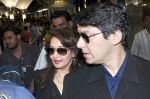 Madhuri dixit snapped with husband in Mumbai Airport on 6th April 2012 (3).jpg