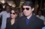 Madhuri dixit snapped with husband in Mumbai Airport on 6th April 2012 (5).jpg