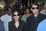 Madhuri dixit snapped with husband in Mumbai Airport on 6th April 2012 (9).jpg