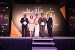 Ms.  Aw Kah Peng, Chief Executive - Singapore Tourist Board presents IIFAWiz Directors, Bipasha Basu & Anil Kapoor a memento of Singapore (depicting the Merlion) at the IIFA Destination Announcement for 2012.JPG