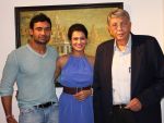 Wrestler Sangram Singh with Payal Rohatgi and curator Nitin Shete at Nitin Shete_s  Eclectic Blend -- collection of works by  veteran artists at Coomaraswamy hall.jpg