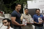 John Abraham, Sanjay Gupta unveil Dongri to dubai book  in Olive, Mumbai on 10th May 2012 (34).JPG
