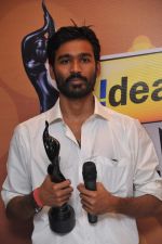Dhanush received  the Best Actor Award Male for the Movie _Aadukalam_, at the _59th !dea Filmfare Awards 2011_ (South) on 8th July at Jawaharlal Nehru indoor stadium, Chennai...jpg