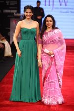 Sonam Kapoor and Hema Malini at the IIJW Inauguration.JPG
