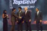 Girish Karkera (Editor, TopGear Magazine), Abhishek Bachchan, Mr. Philipp Von Sahr (President BMW Group India) Receving Car of the year for Mini Cooper S. with Mr. Tarun Rai..jpg