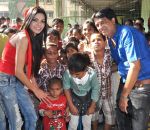 Sherlyn Chopra First Indian Playboy Cover Girl turns Santa for street kids of The Ray of Hope NGO in Mumbai on 16th Dec 2012 (1).JPG