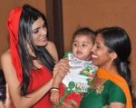 Sherlyn Chopra First Indian Playboy Cover Girl turns Santa for street kids of The Ray of Hope NGO in Mumbai on 16th Dec 2012 (7).JPG