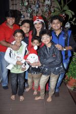 Rakhi Sawant spends Christmas with kids at home in Andheri, Mumbai on 24th Dec 2012 (5).JPG