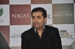 Karan Johar launches the Cover of Amish_s eagerly anticipated 3rd book in the Shiva Trilogy, The Oath of the Vayuputras in Mumbai on 27th Dec 2012 (4).JPG