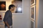 Milind Soman at the Bharti Vidyapeeth photo exhibition in Tao Art Gallery, Mumbai on 1st Jan 2013 (9).JPG