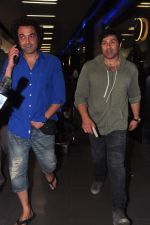 Sunny Deol and Bobby Deol snapped at the airport returning from bangkok after shoot in Mumbai on 13th March 2013 (7).JPG