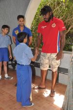 Chris Gayle and Siddharth Mallya spend time with NGO kids in Worli, Mumbai on 26th April 2013 (36).JPG