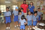 Chris Gayle and Siddharth Mallya spend time with NGO kids in Worli, Mumbai on 26th April 2013 (65).JPG