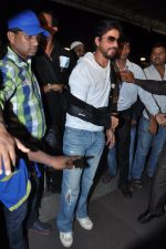 Shahrukh Khan leave for IIFA Macau in Mumbai Airport on 4th July 2013 (40).JPG