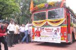 Abhishek Bachchan flags off 2 BEST buses along with Mayor of Mumbai Sunil Prabhu and Yuva Sena President Aditya Thackrey in Mayor_s Bungalow on 8th July 2013 (14).JPG