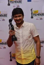 Udhayanidhi Stalin received award for Best Debut (Male) for Oru Kal Oru Kannadi (OKOK) (Tamil).jpg