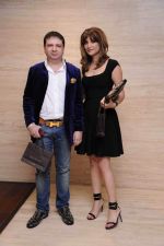Yohan and Michelle Poonawala at RRO Gucci event in Trident Hotel, Mumbai on 23rd Aug 2013.jpg