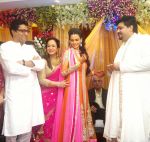 raj thackeray, smita thackeray, aditi redkar and rahul thackray share a moment at the rahul-aditi engagement.jpg