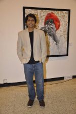 Nagesh Kukunoor at art showing Fellow Travellers by Laxman Aelay in jehangir Art Gallery, Mumbai on 19th nov 2013 (6)_528c621864cee.JPG