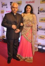 Ramesh & Kiran Sippy walked the Red Carpet at the 59th Idea Filmfare Awards 2013 at Yash Raj_52e39eebe2946.jpg