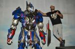 Ashmit Patel pose with Optimus Prime to promote Transformers in Mehboob on 11th June 2014 (23)_53994c5220aed.JPG