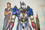 Atul Kasbekar pose with Optimus Prime to promote Transformers in Mehboob on 11th June 2014 (34)_53994c5ddd048.JPG