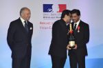 Shah Rukh Khan conferred with Knight of the Legion of Honour in Mumbai on 1st July 2014 (12)_53b3c532abf8b.jpg