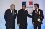 Shah Rukh Khan conferred with Knight of the Legion of Honour in Mumbai on 1st July 2014 (26)_53b3c539147a9.jpg