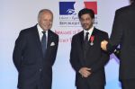 Shah Rukh Khan conferred with Knight of the Legion of Honour in Mumbai on 1st July 2014 (8)_53b3c530db996.jpg