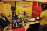 Kareena Kapoor, Ajay Devgan, Rohit Shetty at Singham Returns promotions in Radio Mirchi 98.3 on 30th July 2014 (23)_53da32117f9aa.JPG