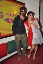 Jacqueline Fernandez & Arjun Rampal at Radio Mirchi Mumbai studio for the promotion of Roy (5)_54acc6e225923.JPG
