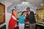 Jacqueline Fernandez & Arjun Rampal pose with RJ Prackriti at Radio Mirchi Mumbai studio for the promotion of Roy (2)_54acc6e370ce0.JPG