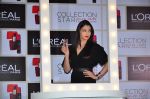 Aishwarya Rai Bachchan unveils L_oreal Pure Reds Collection in Palladium Hotel, Mumbai on 7th Jan 2015 (5)_54ae296e117e3.JPG