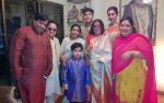 Govind Bansal, Bappi Lahiri, Asha Bhosle, Bappa Lahiri, Chitrani Lahiri, Tanisha Lahiri, Rema Bansal & kid Swastik Lahiri at Bappi Lahiri_s Saraswati Puja (2)_54c612cae9fd3.jpg