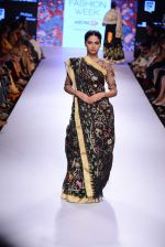 Model walks the ramp for Gaurang Show at Lakme Fashion Week 2015 Day 2 on 19th March 2015 (56)_550c04f110a49.JPG
