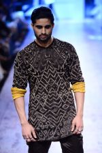 Model walk the ramp for Kunal Rawal Show at Lakme Fashion Week 2015 Day 4 on 21st March 2015 (37)_550ec6c21e611.JPG